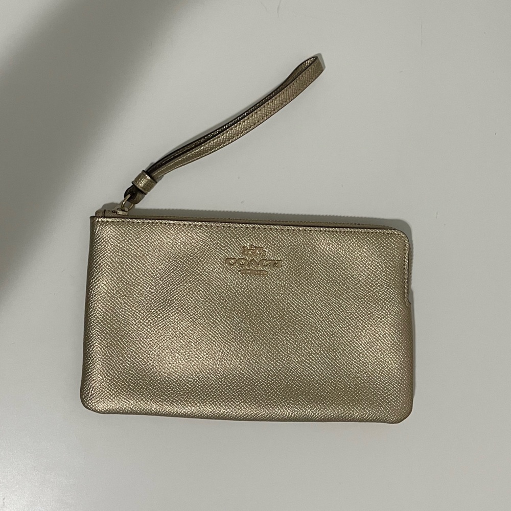 Coach gold wristlet